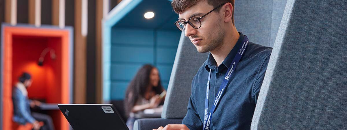 Accounting and Finance MSc Course Image 1200x450 - Man sat with a laptop